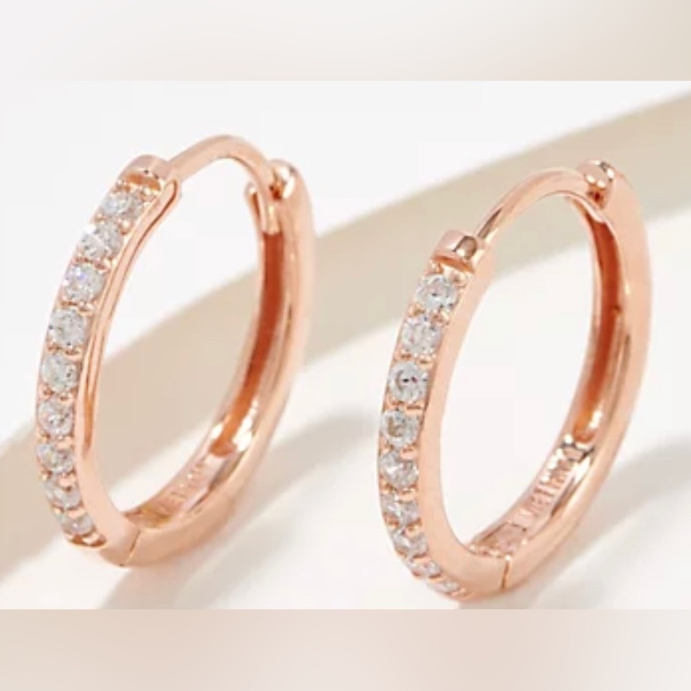 Diamonique rose gold hoops with 9 stones.